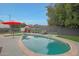 Inviting backyard featuring a pool with seating, an outdoor dining area, and a serene garden at 6746 E Monterosa St, Scottsdale, AZ 85251
