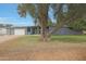 Charming single-story home featuring a wide driveway, desert landscaping, and a modern-style garage door at 6746 E Monterosa St, Scottsdale, AZ 85251