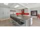 Bright kitchen featuring a large island with seating, stainless steel appliances, and ample cabinet space at 6746 E Monterosa St, Scottsdale, AZ 85251