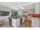 Spacious kitchen featuring an island with seating, stainless steel appliances, and ample cabinet space at 6746 E Monterosa St, Scottsdale, AZ 85251