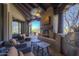Inviting outdoor living space complete with fireplace, grill, and comfortable seating at 7373 E Clubhouse Dr # 24, Scottsdale, AZ 85266