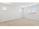 Sunlit bathroom features neutral carpet and bright natural lighting at 7422 W Buckhorn Trl, Peoria, AZ 85383