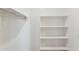 Closet featuring white walls, shelving on the right, and a rail on the left at 7422 W Buckhorn Trl, Peoria, AZ 85383