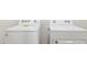 Laundry room features a white Whirlpool washer and dryer set with visible control knobs at 7422 W Buckhorn Trl, Peoria, AZ 85383