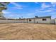 Spacious backyard showcasing a privacy wall surrounding the property at 7526 E Drummer Ave, Mesa, AZ 85208