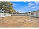 Expansive backyard featuring block fencing and potential for landscaping at 7526 E Drummer Ave, Mesa, AZ 85208