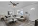 Bright living room featuring neutral tones, stylish decor, and plenty of natural light at 7526 E Drummer Ave, Mesa, AZ 85208