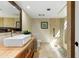 Bathroom showcasing a modern vanity, large mirror, and a walk-in shower with stone accents at 7725 N Via De Fonda --, Scottsdale, AZ 85258