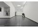 Well-lit three car garage featuring an epoxy floor and plenty of storage space at 786 W Palo Verde W Dr, Casa Grande, AZ 85122