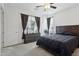 Relaxing main bedroom with dark wood furniture, neutral walls and carpet at 786 W Palo Verde W Dr, Casa Grande, AZ 85122
