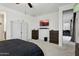 Spacious main bedroom with a ceiling fan, carpet, and modern furniture at 786 W Palo Verde W Dr, Casa Grande, AZ 85122