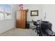 Functional home office area with natural light, desk, and ample storage space at 786 W Palo Verde W Dr, Casa Grande, AZ 85122
