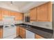 A well-lit kitchen with modern appliances and ample cabinet space at 8155 E Roosevelt St # 204, Scottsdale, AZ 85257