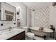 Luxurious bathroom with soaking tub, patterned tile accent wall, and modern vanity at 8238 E San Miguel Ave, Scottsdale, AZ 85250