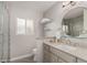 Well-lit bathroom with modern vanity, glass shower door, and stylish fixtures at 8238 E San Miguel Ave, Scottsdale, AZ 85250