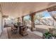 Inviting covered patio with dining area, perfect for outdoor gatherings and relaxation at 8238 E San Miguel Ave, Scottsdale, AZ 85250