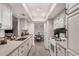 Contemporary kitchen with granite counters, stainless steel appliances, and open layout at 8238 E San Miguel Ave, Scottsdale, AZ 85250