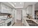 Bright kitchen featuring modern appliances, granite countertops, and ample cabinet space, perfect for culinary adventures at 8238 E San Miguel Ave, Scottsdale, AZ 85250