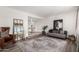 Open living space with hardwood floors, complemented by a stylish rug and modern decor, creating a cozy atmosphere at 8238 E San Miguel Ave, Scottsdale, AZ 85250