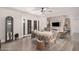 Comfortable living room with a brick fireplace, modern fan, and a serene color palette creating a relaxing space at 8238 E San Miguel Ave, Scottsdale, AZ 85250