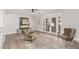 Bright living room with French doors, stylish rug, and comfortable seating at 8238 E San Miguel Ave, Scottsdale, AZ 85250