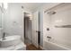Bathroom featuring tile floor, sink and shower over tub at 8438 E Stella Ln, Scottsdale, AZ 85250