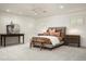 Serene bedroom featuring neutral colors, stylish furniture, and soft lighting, creating a restful retreat at 8602 E Gary Rd, Scottsdale, AZ 85260