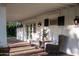Comfortable covered patio featuring charming furniture, offering a relaxing outdoor space with stylish accents at 8602 E Gary Rd, Scottsdale, AZ 85260