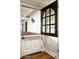 Unique dutch door entrance with transom window providing natural light and farmhouse charm at 8602 E Gary Rd, Scottsdale, AZ 85260