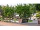 Lush landscaping frames the brick-gated entrance of this beautiful home at 8602 E Gary Rd, Scottsdale, AZ 85260