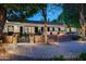 Inviting front porch with brickwork and seating area, perfect for relaxation and enjoying outdoor moments at 8602 E Gary Rd, Scottsdale, AZ 85260