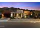 Modern home with desert landscaping, featuring a gated entrance and views of the McDowell Mountains at 9539 S 13Th Way, Phoenix, AZ 85042