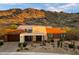 Front exterior showcasing desert landscaping and views of the McDowell Mountains at 9539 S 13Th Way, Phoenix, AZ 85042