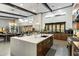 Modern kitchen features a large island, sleek countertops, and stainless steel appliances at 9539 S 13Th Way, Phoenix, AZ 85042