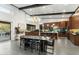 Open-concept kitchen with modern appliances and dining area at 9539 S 13Th Way, Phoenix, AZ 85042