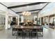 Open concept living space featuring high ceilings, expansive windows, and seamless indoor-outdoor living at 9539 S 13Th Way, Phoenix, AZ 85042