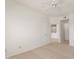 View of a bedroom with carpet and a doorway leading to another room, enhancing the living space at 14000 N 94Th St # 3094, Scottsdale, AZ 85260