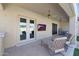 Covered patio with lounge chairs, a ceiling fan, and a view of the pool at 14442 W Lexington Ave, Goodyear, AZ 85395