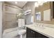 Bathroom featuring a shower-tub, granite-topped vanity and chrome fixtures at 16420 N Thompson Peak Pkwy # 2091, Scottsdale, AZ 85260