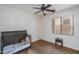 Bedroom with a crib, neutral decor, and natural light at 1712 W Aloe Vera Dr, Phoenix, AZ 85085