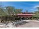 Stunning home with mature desert landscaping, stone accents, and a grand entrance at 1712 W Aloe Vera Dr, Phoenix, AZ 85085