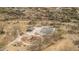 Aerial view of a community park featuring a playground, basketball court, and covered picnic area at 1712 W Aloe Vera Dr, Phoenix, AZ 85085