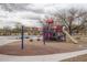 A colorful playground with swings, slides, and climbing structures offers a fun and safe place for children to play at 1712 W Aloe Vera Dr, Phoenix, AZ 85085