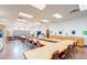 Classroom featuring long tables with chairs, sinks and counterspace, and whiteboard at 1715 Leisure World --, Mesa, AZ 85206