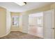 Cozy bedroom featuring plush carpet, neutral walls, and a doorway leading to another room, inviting space at 17828 N 50Th St, Scottsdale, AZ 85254