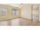 Bright living room with tile flooring, large windows for natural light, and neutral wall colors at 17828 N 50Th St, Scottsdale, AZ 85254