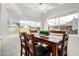 Dining room featuring a wood dining table and natural light from large windows at 1840 E Jarvis Ave, Mesa, AZ 85204