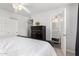 Spacious main bedroom featuring a large dresser and an ensuite bathroom at 1840 E Jarvis Ave, Mesa, AZ 85204