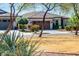 Charming single-story home featuring desert landscaping and a tile roof at 2185 N Beverly Pl, Buckeye, AZ 85396