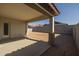 Covered patio overlooking a large backyard at 2887 W Chevelon Dr, Queen Creek, AZ 85144